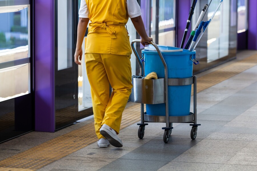 Denver Janitorial Company janitor mopping floor